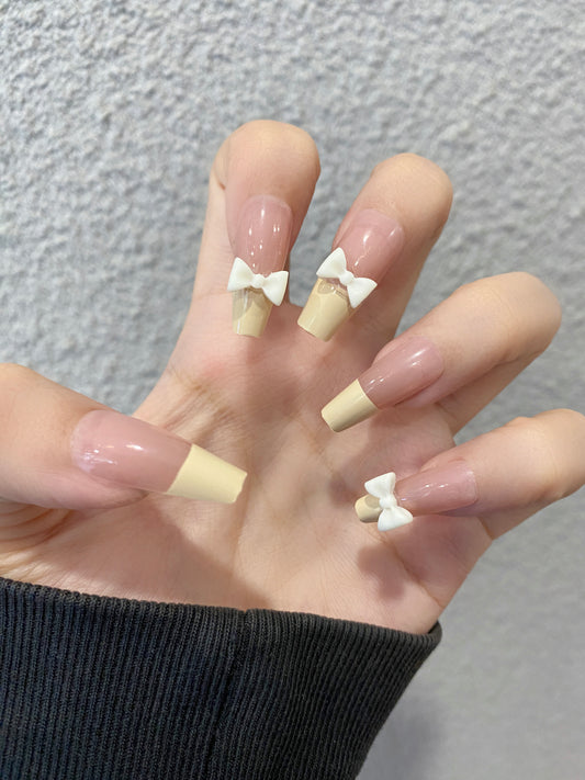 French nail tip with  bow